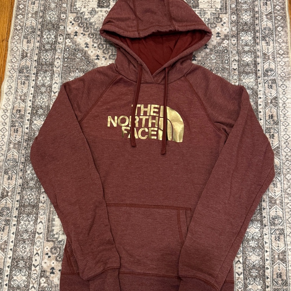 The North Face Women’s Burgundy Hoodie with Gold Logo